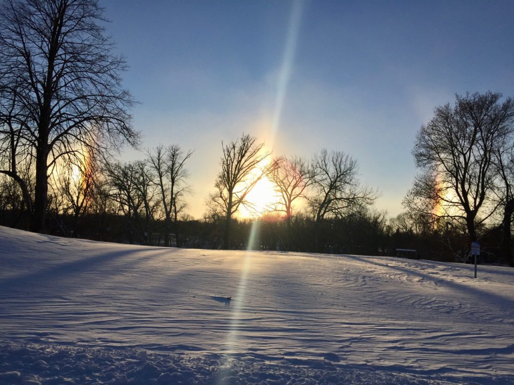 Sun dog over snow