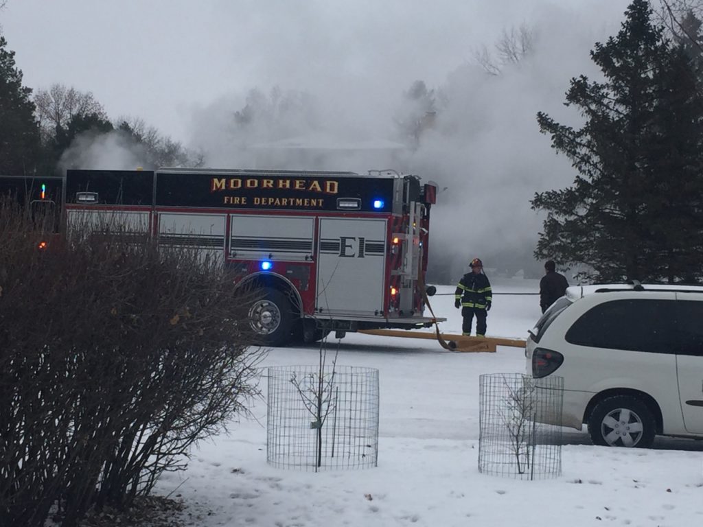 fire truck and house with smoke